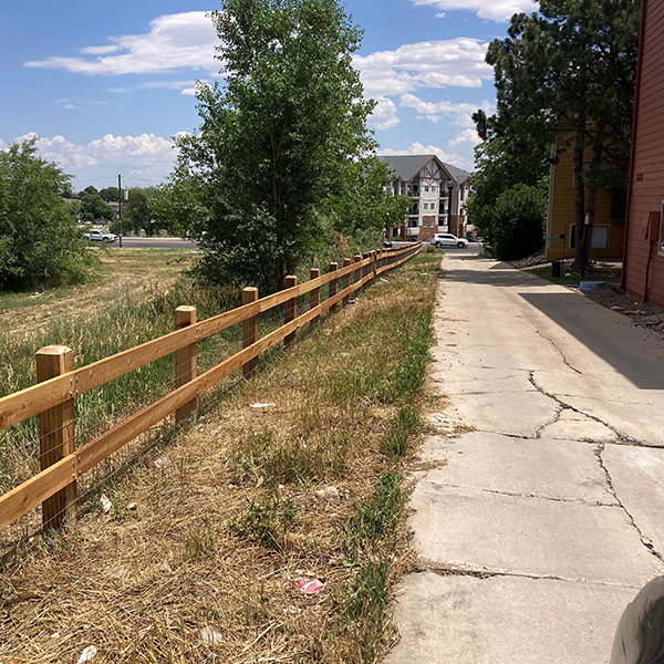 Wooden fence around houses
